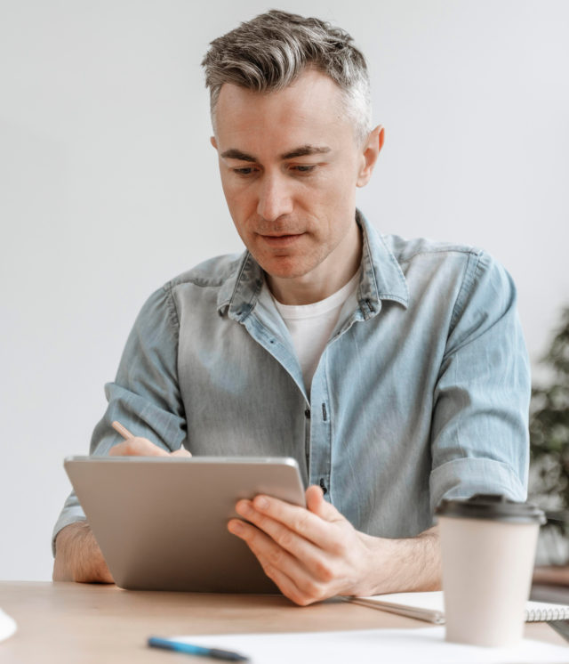 portrait-man-working-tablet